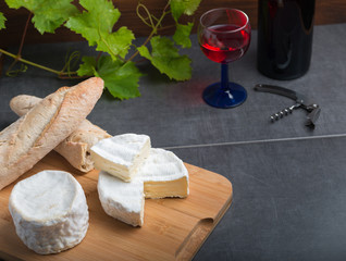 variation of cheese and wine and bread