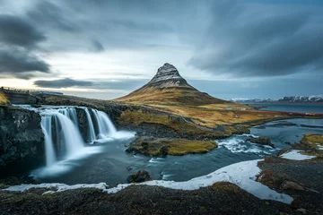 Peel and stick wall murals Waterfalls Beautiful landscape of Kirkjufellsfoss with background of remarkable mountain, landmark of iceland during late winter