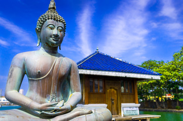 Buddha statue in Gangarama Buddhist Temple, Sri Lanka