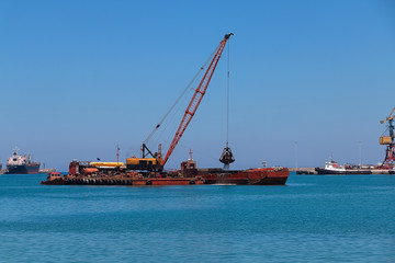 Fototapeta premium Harbor for fishing boats and large ships.