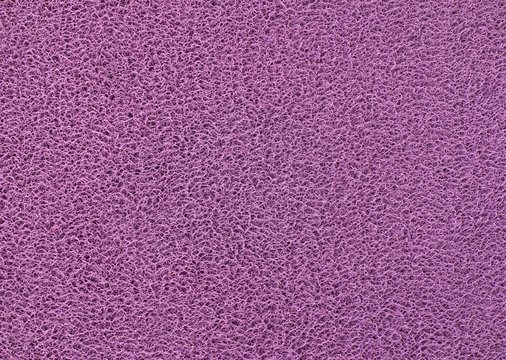 Texture Background of The Purple Plastic Doormat