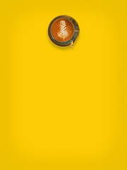 Top view of hot coffee cup on yellow background.