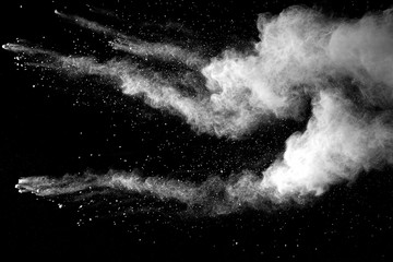 Explosion of white dust on black background. - 174955200
