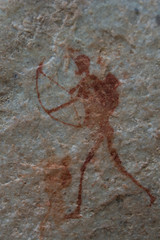 Ancient rock art painting of an archer in the Cederberg Wilderness Area, South Africa