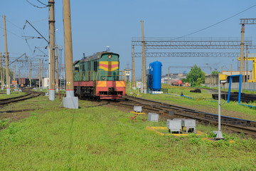 locomotive at the railway station on a summer sunny day