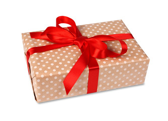 Christmas holiday gift box in spotted paper isolated on white