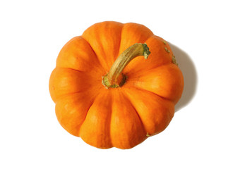 Top view of vibrant orange color ripe pumpkin with stem isolated on white background 