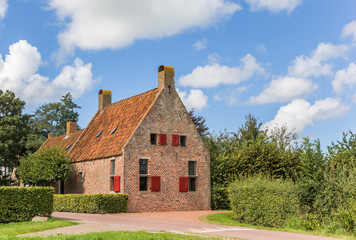 Historic red brick house in the village of Wetsinge