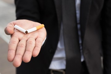 A new generation of businessman refusing cigarettes concept for quitting smoking and healthy...
