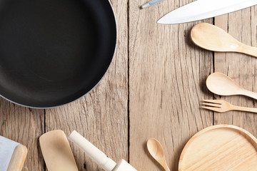 Kitchen utensils,wooden spoon on old wood table background with copy space.