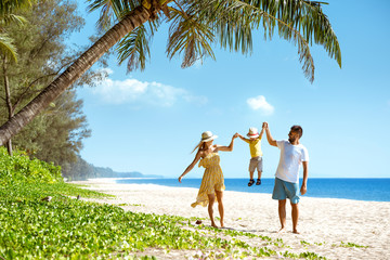 Happy family walking beach tourism