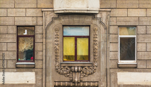 Three Windows In A Row On Facade Of Urban Apartment Building Front Three Windows In A Row On Facade Of Urban Apartment Building Front View St