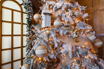 Beatiful christmas decorated tree in shining lights