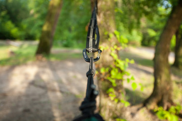 Closeup of hammock straps on the tree