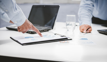 Business people are discussing the work they have to do, In a meeting about Improve the system in work In their various work sections.