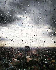 Rain drops on an urban window 