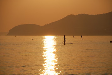 Silouhette of a paddle boarder