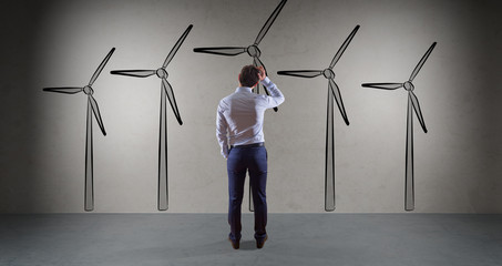 Businessman drawing renewable energy sketch on a wall 3D rendering