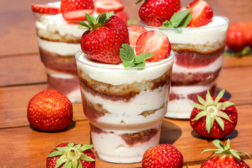 sponge cake decorated strawberries and mint