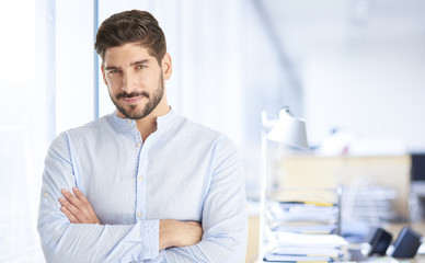 Fototapeta premium Confident young businessman portrait