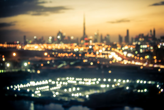 Blurred aerial view of Dubai at night time
