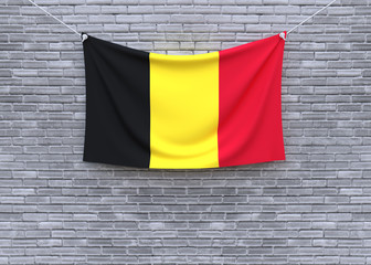 Belgium flag hanging on brick wall. 3D illustration