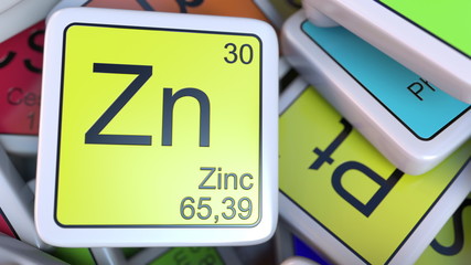 Zinc Zn block on the pile of periodic table of the chemical elements blocks. Chemistry related 3D rendering