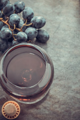 cognac glass and grapes