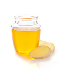  jar of honey and ginger on white background