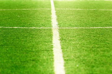 Obraz premium Boisko do piłki nożnej, środek i linia boczna.
