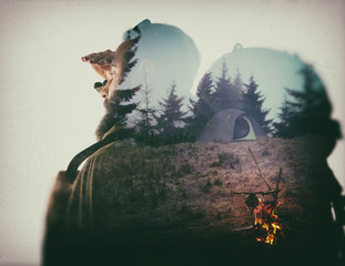 Photo of stylish bearded traveler looking into the distance. Double exposure, beautiful mountain...