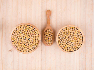 created shot of beans on wooden bowl in studio