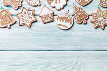 Christmas wooden background with gingerbread cookies