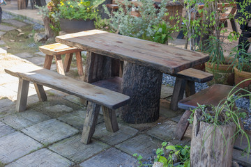 The old wooden table and benches in the garden.