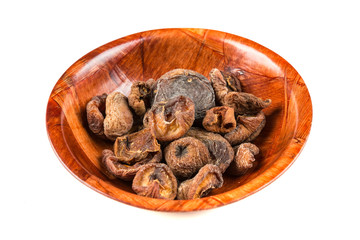 Organic dried apricots isolated on a white background