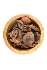 Organic dried apricots isolated on a white background