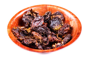 Organic sun dried tomatoes isolated on a white background