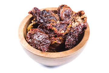 Organic sun dried tomatoes isolated on a white background