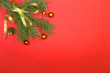 Christmas decorations with tree and colored balls on wooden background
