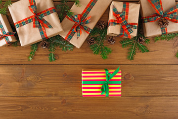 Fototapeta premium Colorful present boxes for any holiday on wooden background