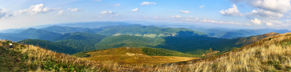 Beautiful panoramic view of the Bieszczady mountains in the early autumn, Bieszczady National Park (Polish: Bieszczadzki Park Narodowy), Poland. © udmurd