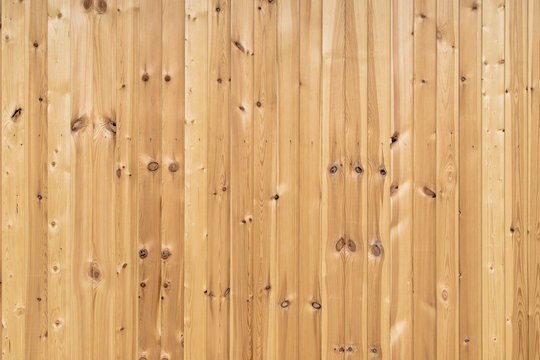 Yellow wood plank wall vertical texture background