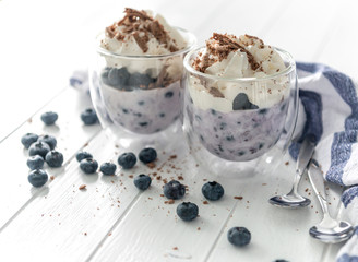Dessert from yogurt with blueberries and chocolate 