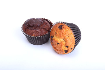 Fresh homemade muffins on white background. Top view.