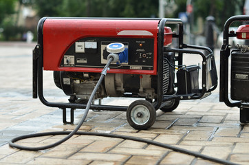 electric generator on city street - obrazy, fototapety, plakaty