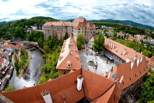 Aerial Panorama Of Cesky Krumlov Castle Courtyard. South Bohemia, Czech Republic