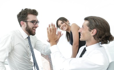 business colleagues giving each other high five.