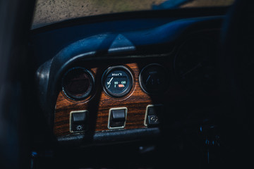 Retro interior of old automobile with reflection