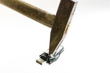 from rage, with a hammer destroyed USB stick. isolated on white background