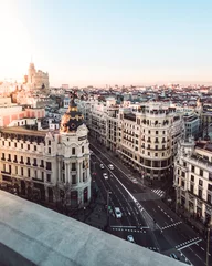 Photo sur Plexiglas Madrid Gran Via, Madrid au coucher du soleil (Espagne)
